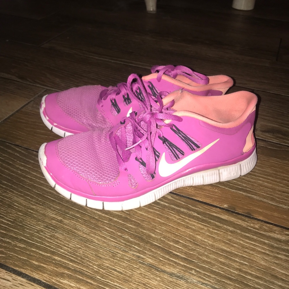 Pink Nike running shoes